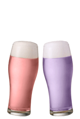 乾杯でビールグラスから出るカラフルな泡
